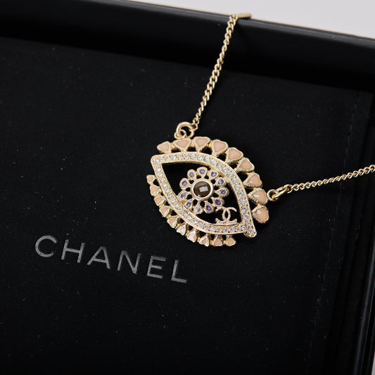 Chanel crystal evil eye heart medallion necklace