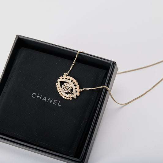 Chanel crystal evil eye heart medallion necklace